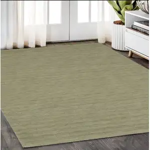 Photo of Sage And Green Wool Hand Tufted Area Rug