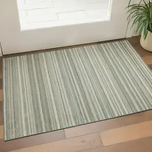 Photo of Sage And Ivory Striped Washable Area Rug With UV Protection