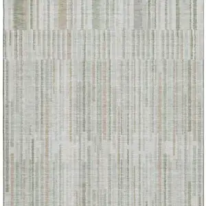 Photo of Sage And Ivory Striped Washable Area Rug With UV Protection