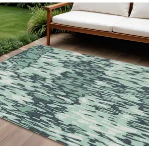 Photo of Sage Black And Ivory Striped Washable Indoor Outdoor Area Rug