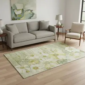 Photo of Sage Gold And Ivory Floral Washable Area Rug With UV Protection