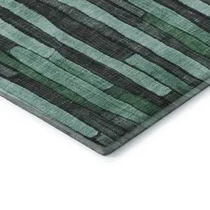 Photo of Sage Gray And Teal Striped Washable Area Rug With UV Protection