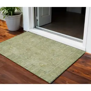 Photo of Sage Green And Brown Oriental Washable Indoor Outdoor Area Rug