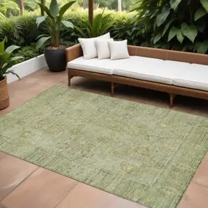 Photo of Sage Green And Brown Oriental Washable Indoor Outdoor Area Rug