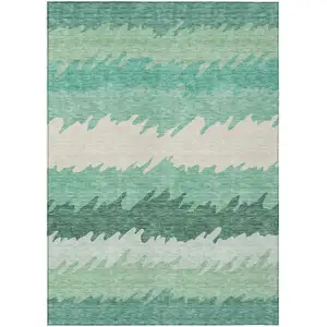 Photo of Sage Green And Ivory Striped Washable Indoor Outdoor Area Rug