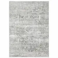Photo of Sage Green Grey Ivory And Silver Oriental Printed Stain Resistant Non Skid Area Rug