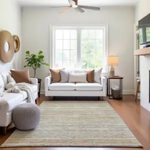 Photo of Sage Ivory And Gold Striped Washable Area Rug With UV Protection