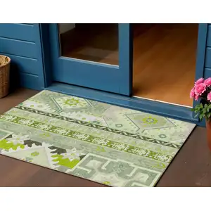 Photo of Sage Olive Green And Ivory Aztec Washable Indoor Outdoor Area Rug