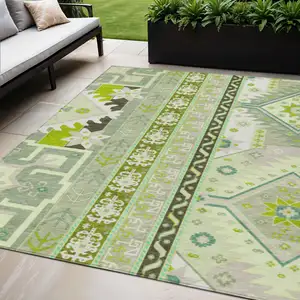 Photo of Sage Olive Green And Ivory Aztec Washable Indoor Outdoor Area Rug
