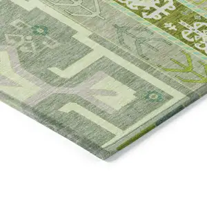 Photo of Sage Olive Green And Ivory Aztec Washable Indoor Outdoor Area Rug
