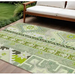 Photo of Sage Olive Green And Ivory Aztec Washable Indoor Outdoor Area Rug