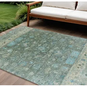 Photo of Sage Teal Blue And Beige Tribal Washable Indoor Outdoor Area Rug