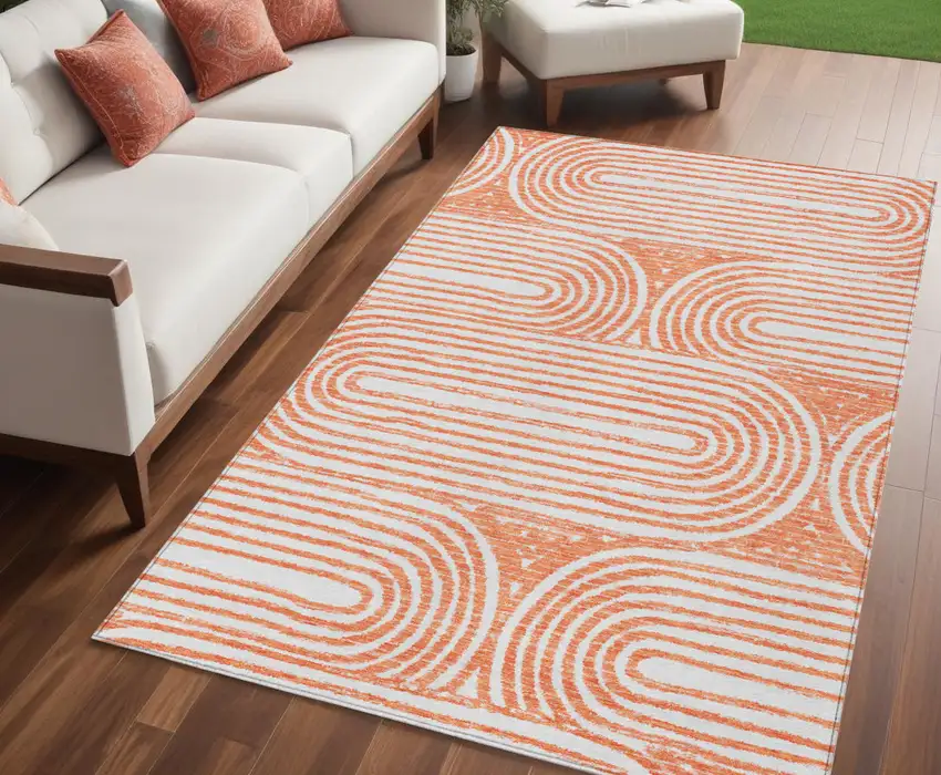 Orange and Ivory Abstract Washable Non Skid Indoor Outdoor Area Rug Photo 1