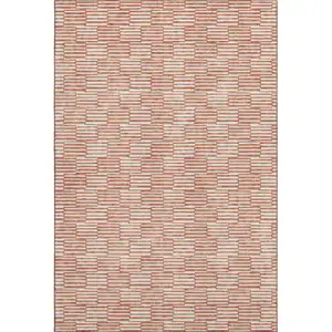 Photo of Salmon And Beige Abstract Geometric Washable Area Rug With UV Protection