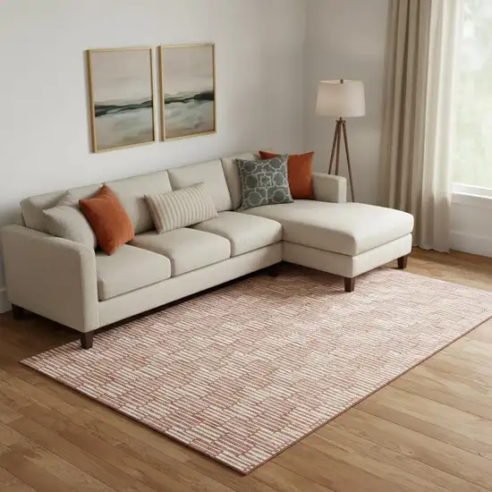 Salmon And Beige Abstract Geometric Washable Area Rug With UV Protection Photo 1