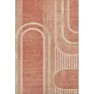 Photo of Salmon And Beige Geometric Washable Area Rug With UV Protection