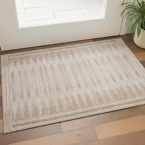 Photo of Salmon And Beige Geometric Washable Area Rug With UV Protection