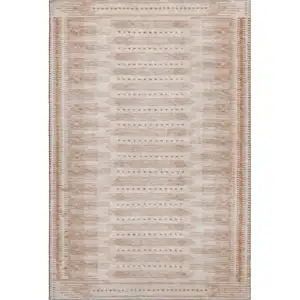 Photo of Salmon And Beige Geometric Washable Area Rug With UV Protection