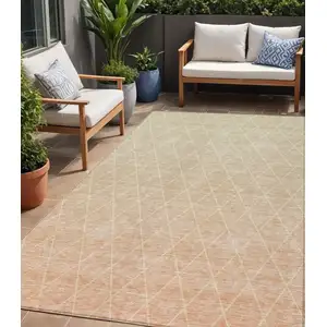 Photo of Salmon And Beige Geometric Washable Indoor Outdoor Area Rug