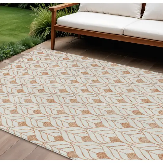 Salmon And Beige Geometric Washable Indoor Outdoor Area Rug Photo 1