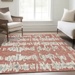 Photo of Salmon And Beige Striped Washable Area Rug With UV Protection