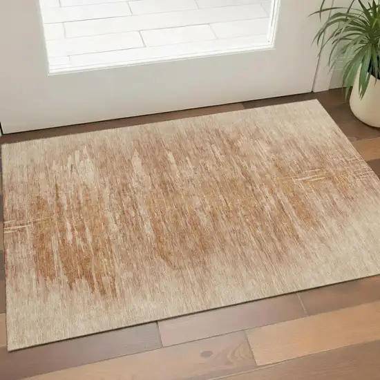 Salmon And Copper Abstract Washable Area Rug With UV Protection Photo 1