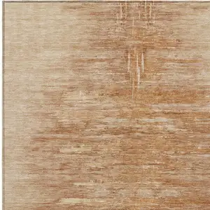 Photo of Salmon And Copper Abstract Washable Indoor Outdoor Area Rug