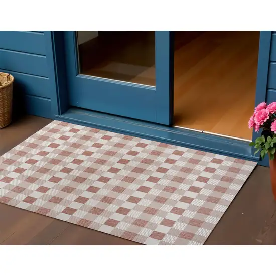 Salmon And Cream Geometric Indoor Outdoor Area Rug Photo 1