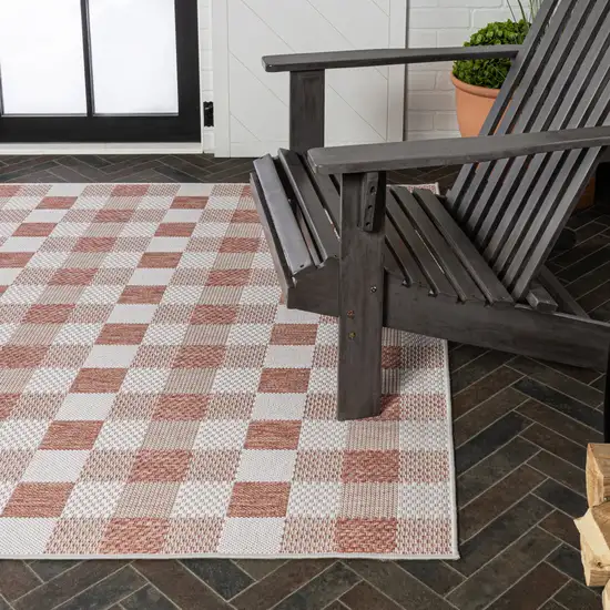 Salmon And Cream Geometric Indoor Outdoor Area Rug Photo 9