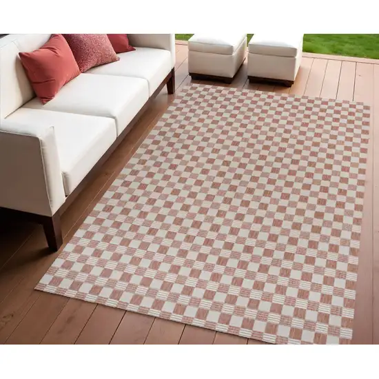 Salmon And Cream Geometric Indoor Outdoor Area Rug Photo 1