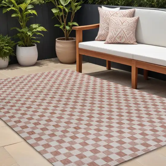 Salmon And Cream Geometric Indoor Outdoor Area Rug Photo 1