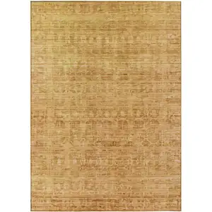 Photo of Salmon And Gold Abstract Washable Indoor Outdoor Area Rug