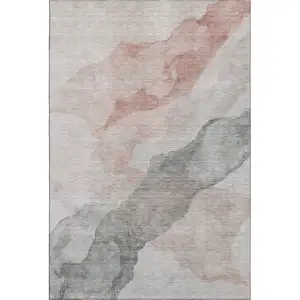 Photo of Salmon And Gray Abstract Washable Area Rug With UV Protection