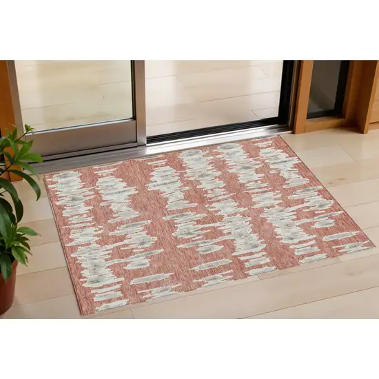 Salmon And Gray Striped Washable Indoor Outdoor Area Rug Photo 1