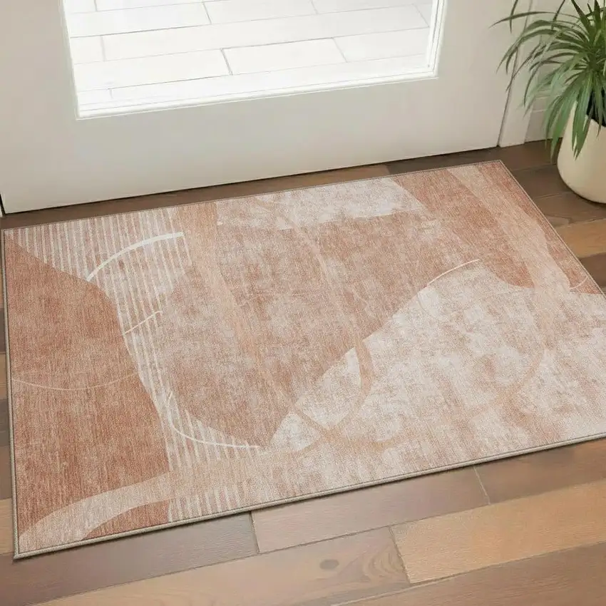 Salmon And Ivory Abstract Geometric Washable Area Rug With UV Protection Photo 1