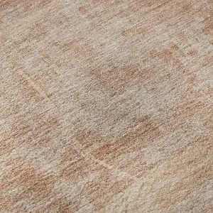 Photo of Salmon And Ivory Abstract Geometric Washable Area Rug With UV Protection