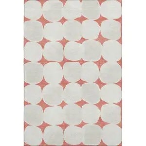 Photo of Salmon And Ivory Abstract Geometric Washable Area Rug With UV Protection
