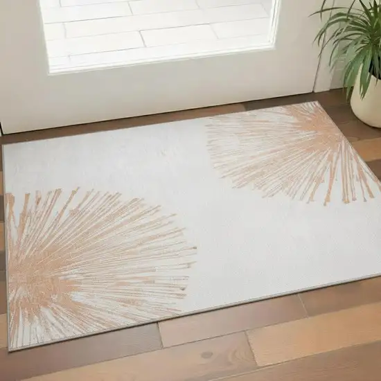 Salmon And Ivory Abstract Washable Area Rug With UV Protection Photo 1