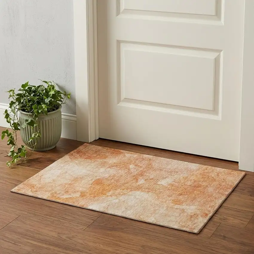 Salmon And Ivory Abstract Washable Area Rug With UV Protection Photo 1