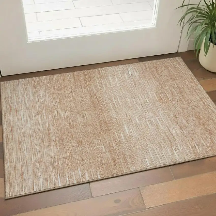 Salmon And Ivory Abstract Washable Area Rug With UV Protection Photo 1