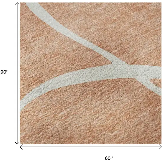 Salmon And Ivory Abstract Washable Area Rug With UV Protection Photo 9