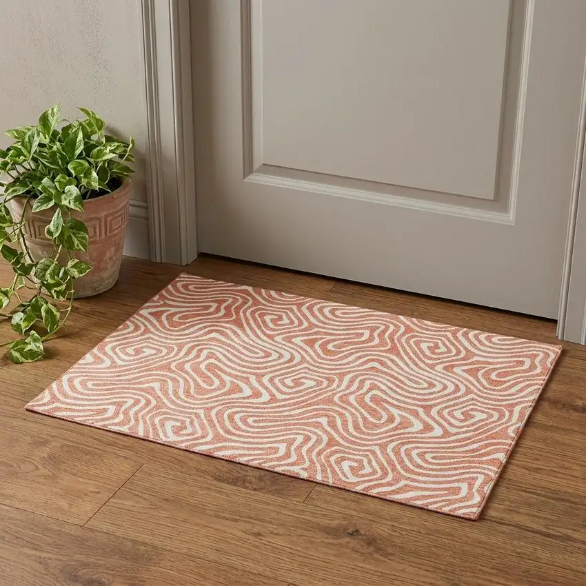 Salmon And Ivory Abstract Washable Area Rug With UV Protection Photo 1