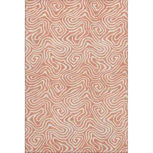 Photo of Salmon And Ivory Abstract Washable Area Rug With UV Protection
