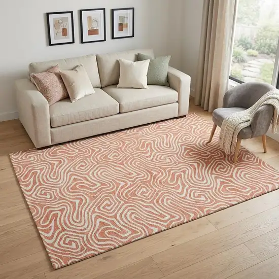 Salmon And Ivory Abstract Washable Area Rug With UV Protection Photo 1