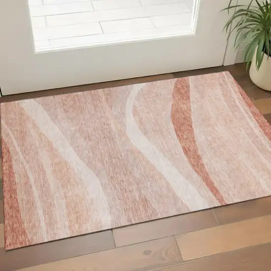 Salmon And Ivory Abstract Washable Area Rug With UV Protection Photo 1