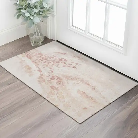 Salmon And Ivory Abstract Washable Area Rug With UV Protection Photo 2