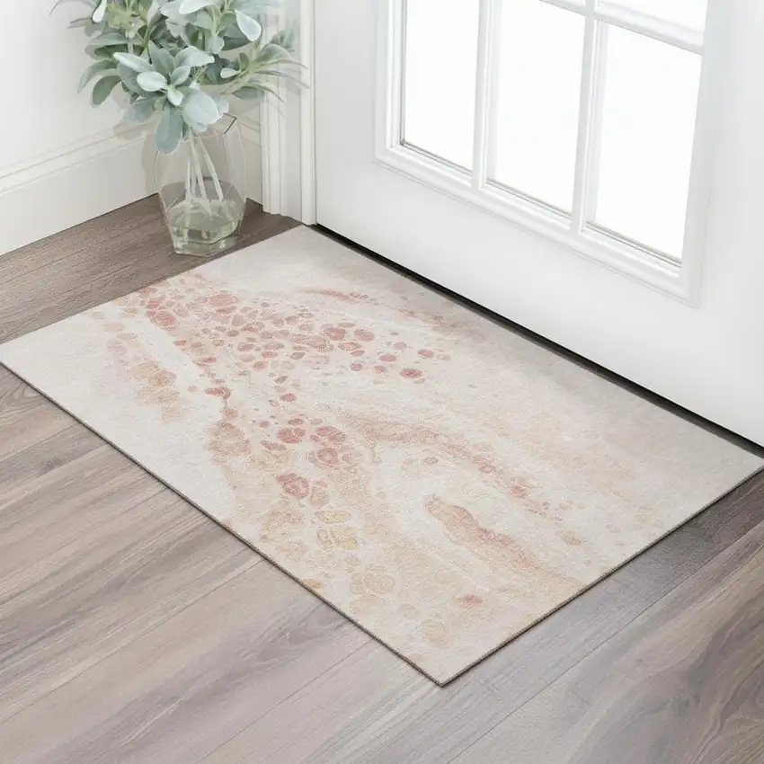 Salmon And Ivory Abstract Washable Area Rug With UV Protection Photo 2