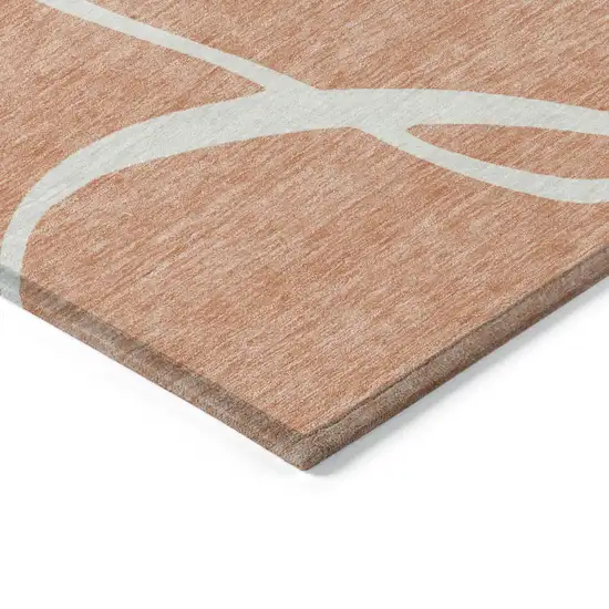 Salmon And Ivory Abstract Washable Indoor Outdoor Area Rug Photo 4