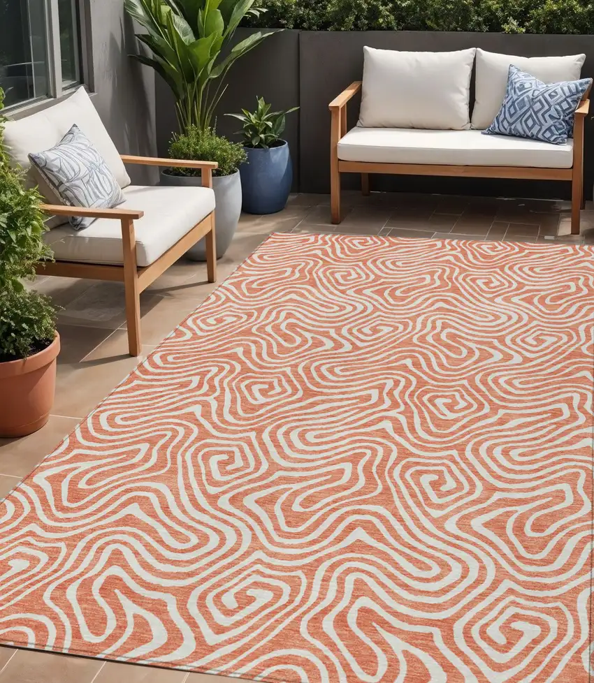 Salmon And Ivory Abstract Washable Indoor Outdoor Area Rug Photo 1
