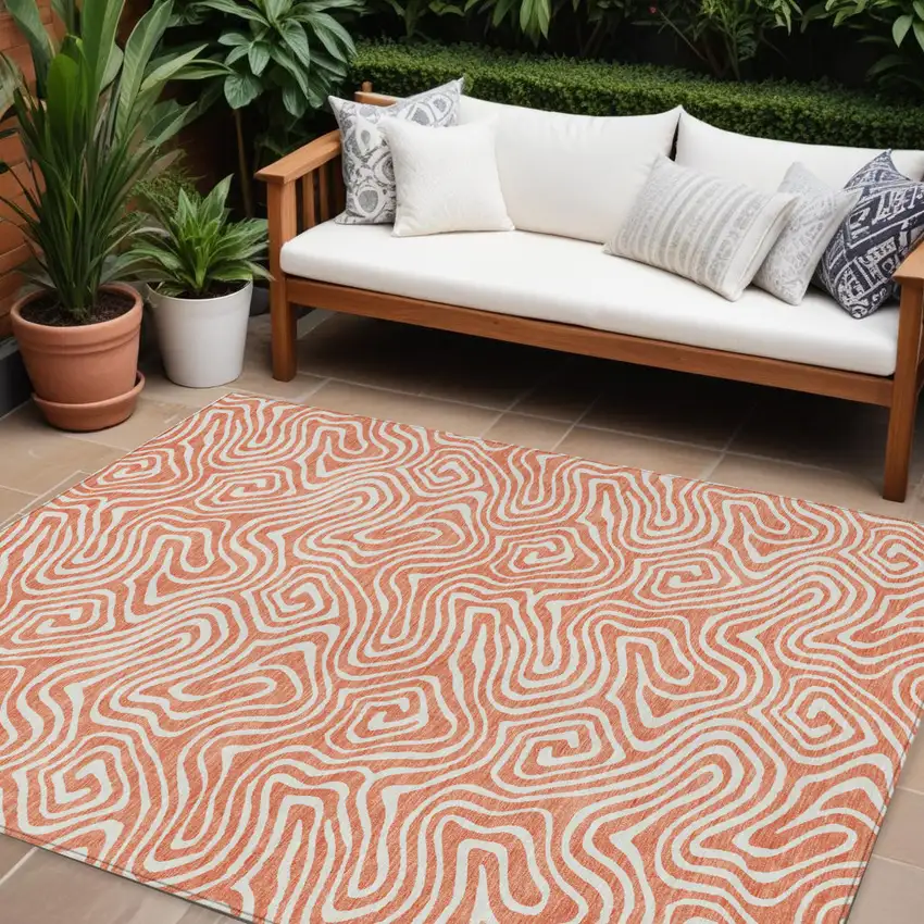 Salmon And Ivory Abstract Washable Indoor Outdoor Area Rug Photo 1